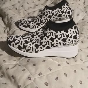 Brand new DKNY high heel slip on tennis shoes